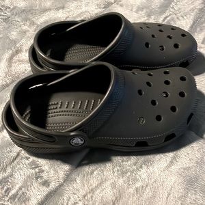 Black crocs.  Never worn.  Small.  Not sure what size means (J3)